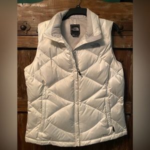 North Face Winter White Vest, 550. Excellent condition. Large. Silver lining